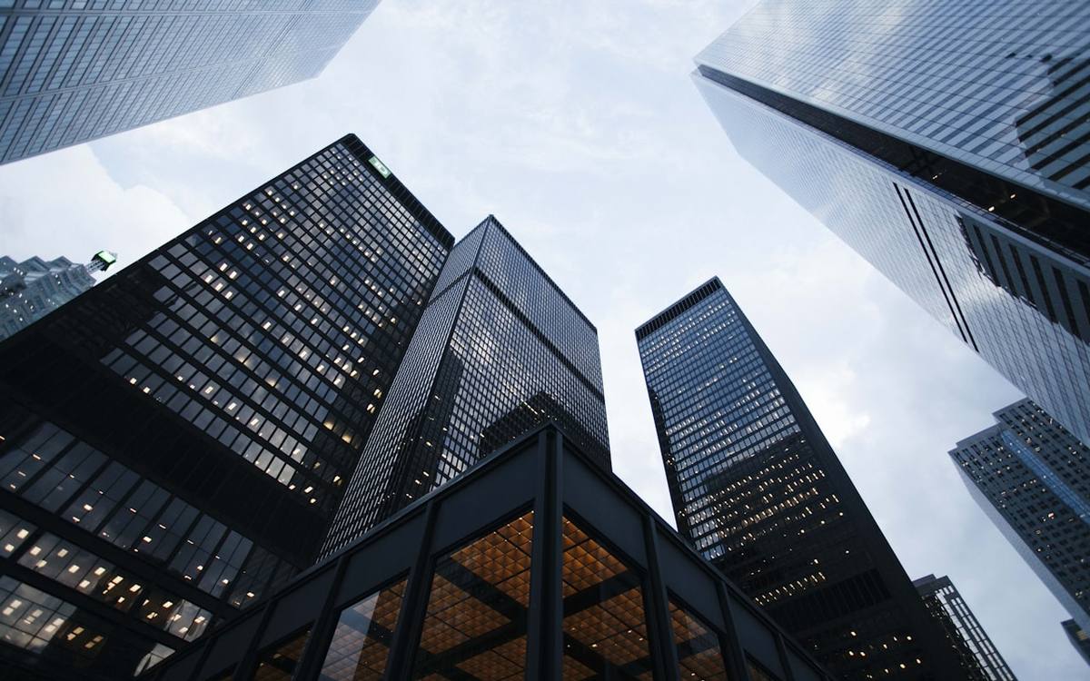 Modern towers representing infrastructure-linked advisory